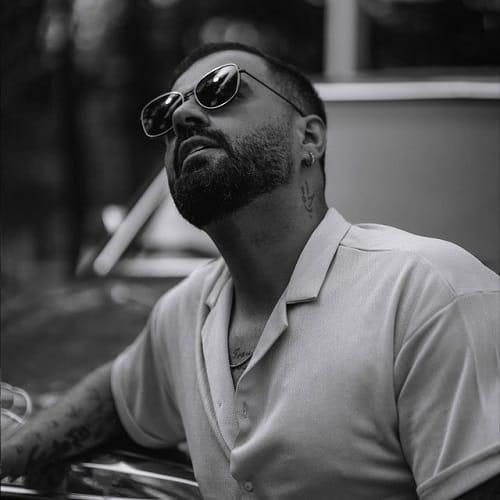 دانلود آهنگ دمق شدم و کم حرف شدم ولی نبودنتو چه خوب بلد شدم از رضا شیری